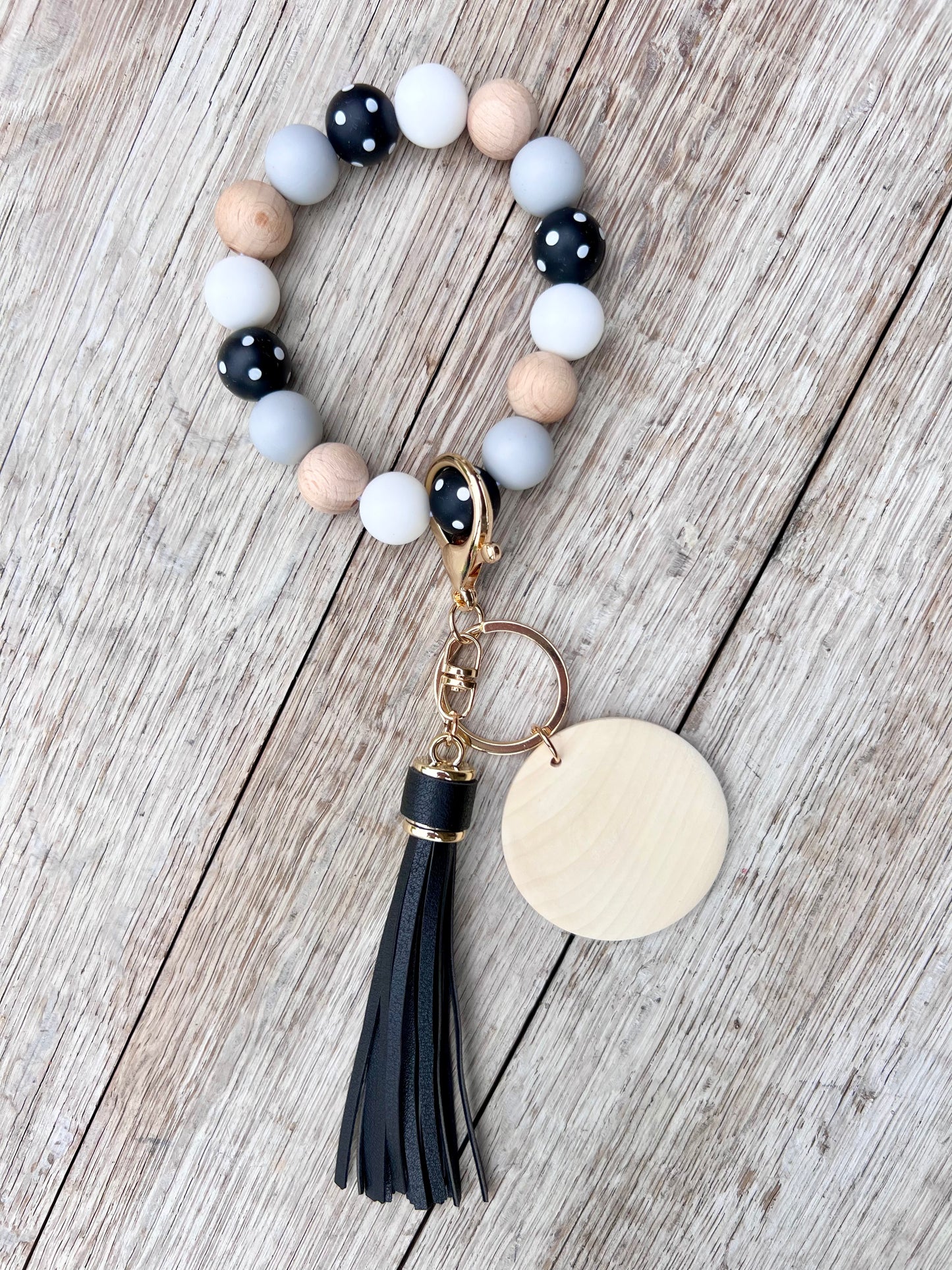 DOTTY Wristlet w/Faux Leather Tassel